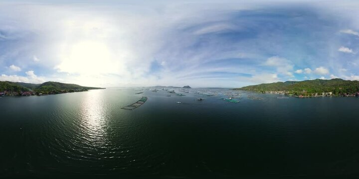 A fish farm on Lake Taal near an active volcano. VR 360. Farming aquaculture or pisciculture practices. Philippines, Luzon.