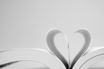 Black and White Heart Shape- Create from book on Pink Background - Dark Valentine Day - Love Concept 