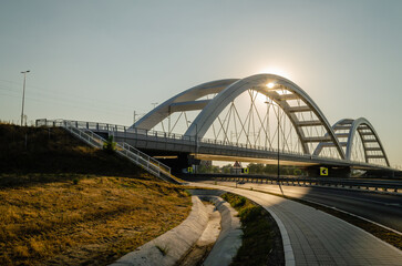 Novi Sad, Serbia. July - 25. 2022. Zezelj bridge on river Danube in Novi Sad. View of the Zezelje Bridge on the Danube in Novi Sad from the Petrovaradin side in the summer and in the afternoon.