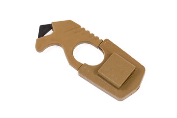 Strap cutter in plastic scabbard on a white background