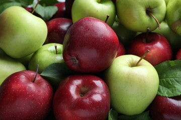 Fresh ripe green and red apples as background, closeup