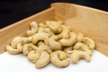 Cashews on a bamboo board