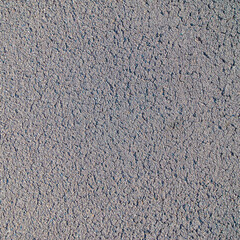 cracked black concrete surface The style of decoration has a rough texture.