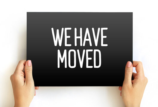 WE HAVE MOVED text business concept on card for presentations and reports
