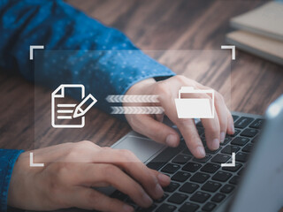 Businessmen use a laptop to transfer, backup, and download documents online. Receive - send, and...