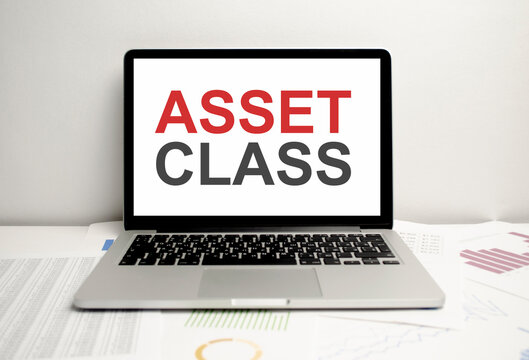 Asset Class Words On Laptop Display And Charts