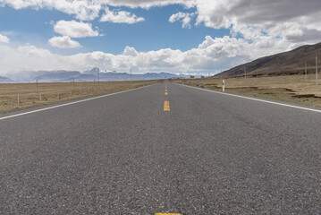Asphalt road with lane line reach out into the distance