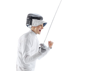 Portrait of professional male fencer in fencing costume and mask holding smallsword isolated on white background. Sport, emotions, energy, skills