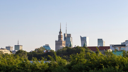 view from the park to the city center.  skyline of Warsaw city.  buildings in the fog on the background.  view of Warsaw, Stalinka building