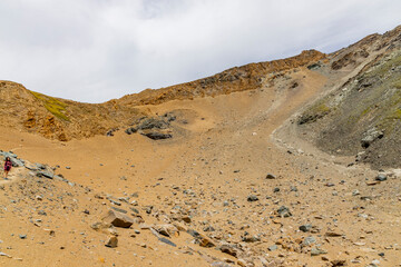 Excursion to the Gran Paradiso in the Alps. Search for rocks, minerals and precious stones. Study of the surface of rocks with sedimented debris over time. Lunar landscape, Martian landscape.