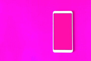 The concept of online orders. A white phone with a pink flat screen on a lilac background.