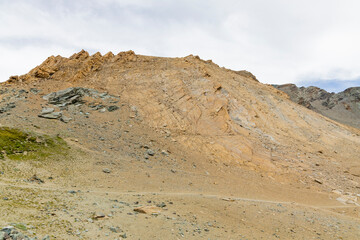 Excursion to the Gran Paradiso in the Alps. Search for rocks, minerals and precious stones. Study of the surface of rocks with sedimented debris over time. Lunar landscape, Martian landscape.