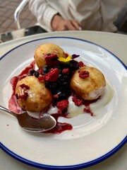 cottage cheese pancakes with berries and sour cream