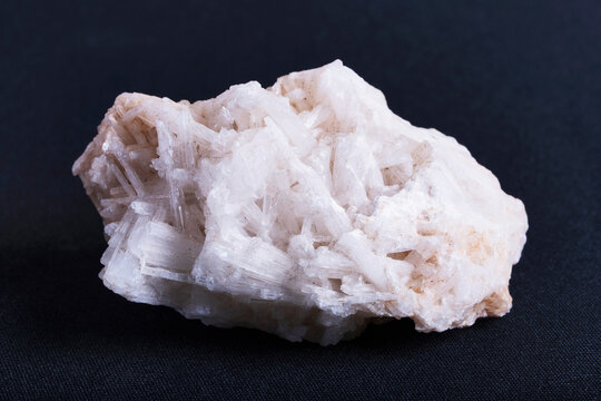 Natrolite a tectosilicate mineral species belonging to the zeolite group. It is a hydrated sodium and aluminium silicate