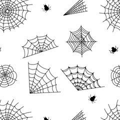 pattern consisting of webs and spiders on a white background