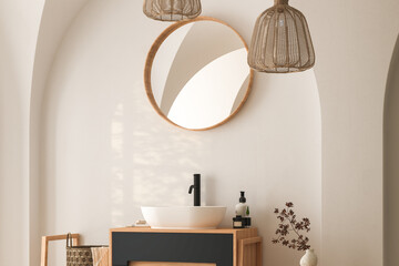 Interior of modern bathroom with white walls, wooden floor, dry plants, arches, white sink standing on wooden countertop and a oval mirror hanging above it. 3d rendering
