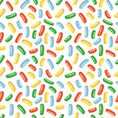 Seamless pattern with white donut icing with lots of decorative bright sprinkles. Vector illustration of colorful candy sprinkles for fabrics, textures, wallpapers, posters, cards.