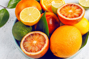 front view fresh sliced orange on dark background ripe mellow fruit juice color citrus tree citrus, Whole and sliced ripe oranges placed on marble background, half orange fruit.