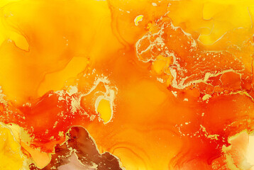 Abstract colorful background, wallpaper. Bright alcoholic ink, mixing of acrylic paints. Modern art, painting, a mixture of orange and red colors, glowing golden streaks