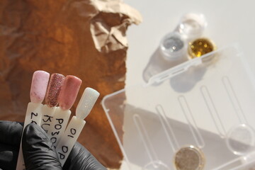 Tools for manicure and pedicure on a light background. Content for the nailmaster. Necessary materials when working in a beauty salon.