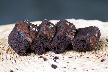 Delicious chocolate brownie homemade, ingredients of brownie,closeup fudge brownie,homemade bakery and dessert,Pieces of fresh brownie,confectionery concept.