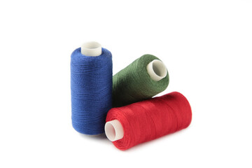 Color sewing threads isolated on white background