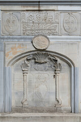 Istanbul, Turkey - June 18 2022: Vertical tugra and some Arabic inscriptions and ornaments on marble