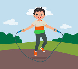 Little boy jumping rope at the park