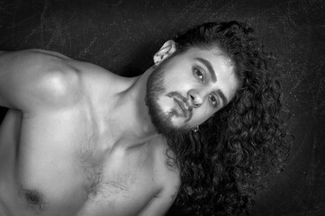 Portrait of a young man with a beard - 520009492