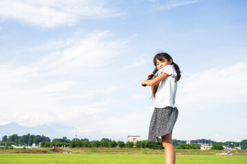 子どもの野球　草野球　女子　女の子　日本人　スポーツ