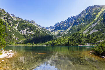 Fototapeta na wymiar Poprad Mountain Lake, or Popradske Pleso, is the mountain lake located in the High Tatras, Slovakia