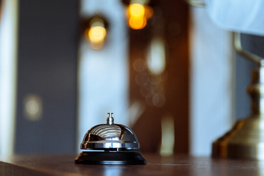 Hotel service bell on a table in hotel. Concept of hotel or restaurant
