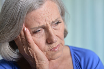 Close up portrait of sick senior woman
