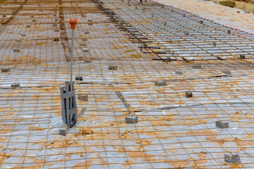 The process of making reinforcement steel bars for concrete foundations at construction site