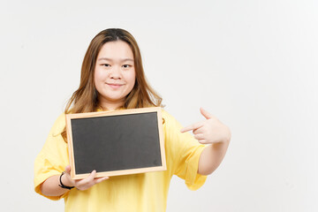 Showing, Presenting and holding Blank Blackboard of Beautiful Asian Woman wearing yellow T-Shirt