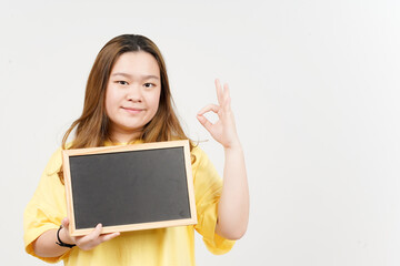 Naklejka premium Showing, Presenting and holding Blank Blackboard of Beautiful Asian Woman wearing yellow T-Shirt