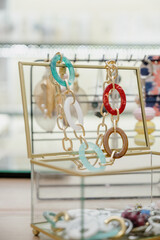 Shop window with necklaces and jewelry. Custome jewelry on display