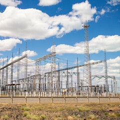 large electrical substation in the desert against the blue sky