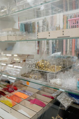 Shop window with necklaces and jewelry. Custome jewelry on display