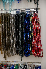 Shop window with necklaces and jewelry. Custome jewelry on display