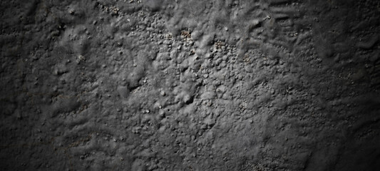 Dark black stone background. scary black concrete texture. Stone wall background.