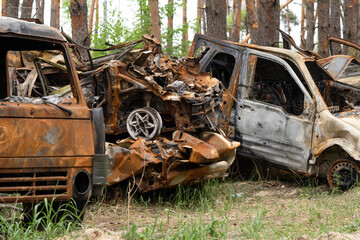 Cars of civilians were shot. Russia's war against Ukraine. Burnt and blown up car
