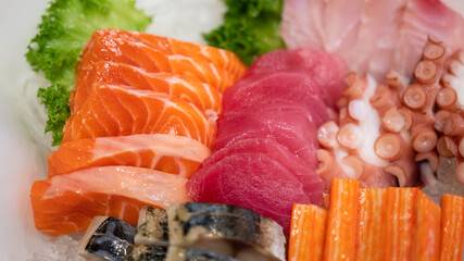 Set of premium sashimi meat, various kind of sliced raw fish meat such as salmon, tuna and snapper....