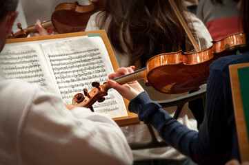 Symphonic orchestra performing on stage