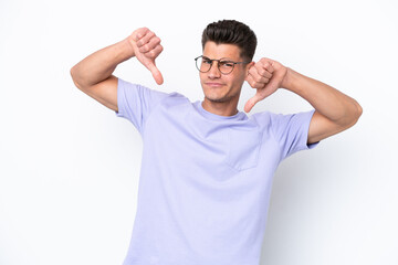 Fototapeta premium Young caucasian man isolated on white background proud and self-satisfied