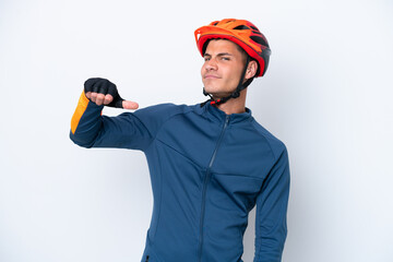 Young cyclist caucasian man isolated on white background proud and self-satisfied