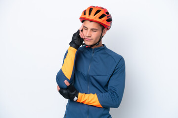 Young cyclist caucasian man isolated on white background with headache