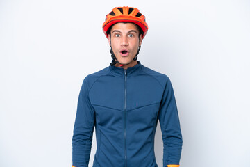 Young cyclist caucasian man isolated on white background with surprise facial expression