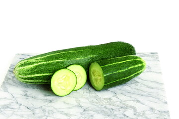 fresh cucumber cut slice and whole isolated on white background with copy space