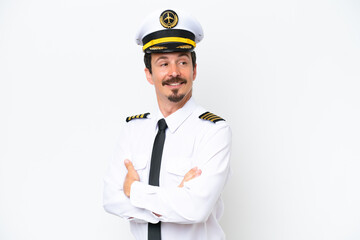 Airplane caucasian pilot isolated on white background with arms crossed and happy